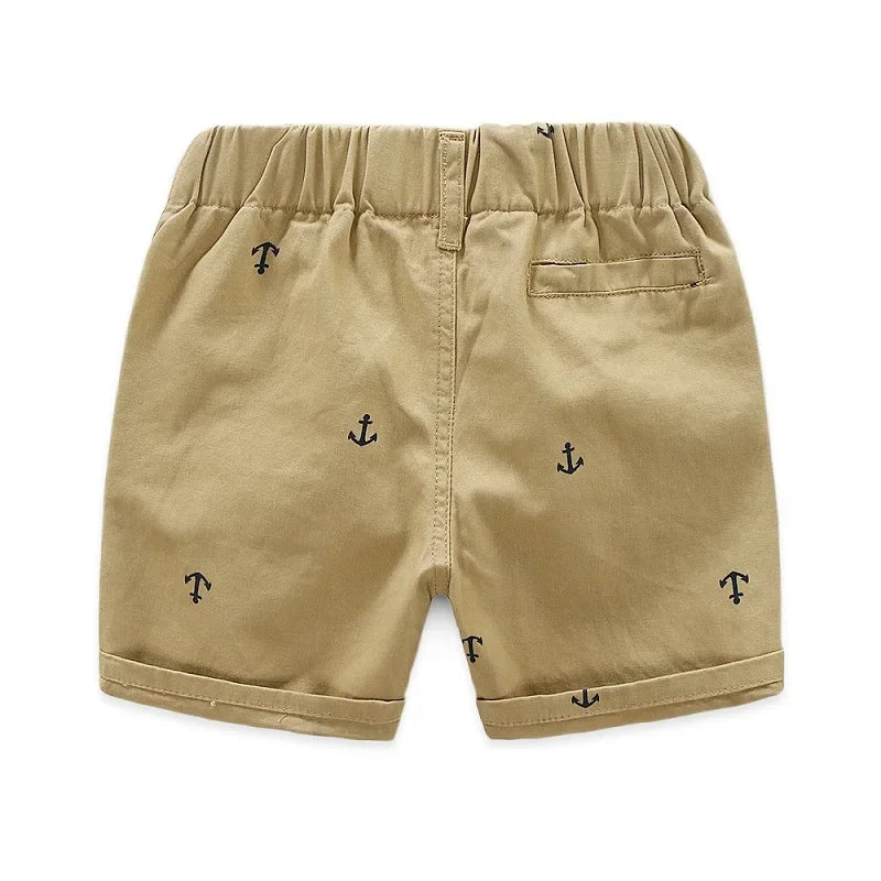 Khaki boys cotton beach shorts featuring a repeating anchor print