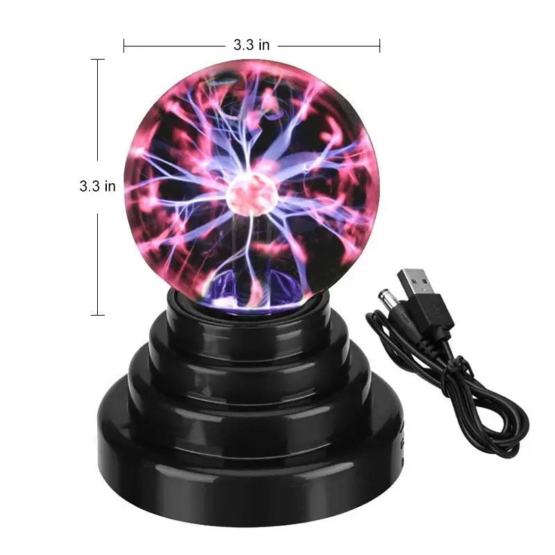 A black base holds a glowing pink and purple plasma ball lamp with intricate electrical patterns.