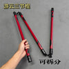 A pair of red and black cosplay props, likely for a character, are shown against a gray background.
