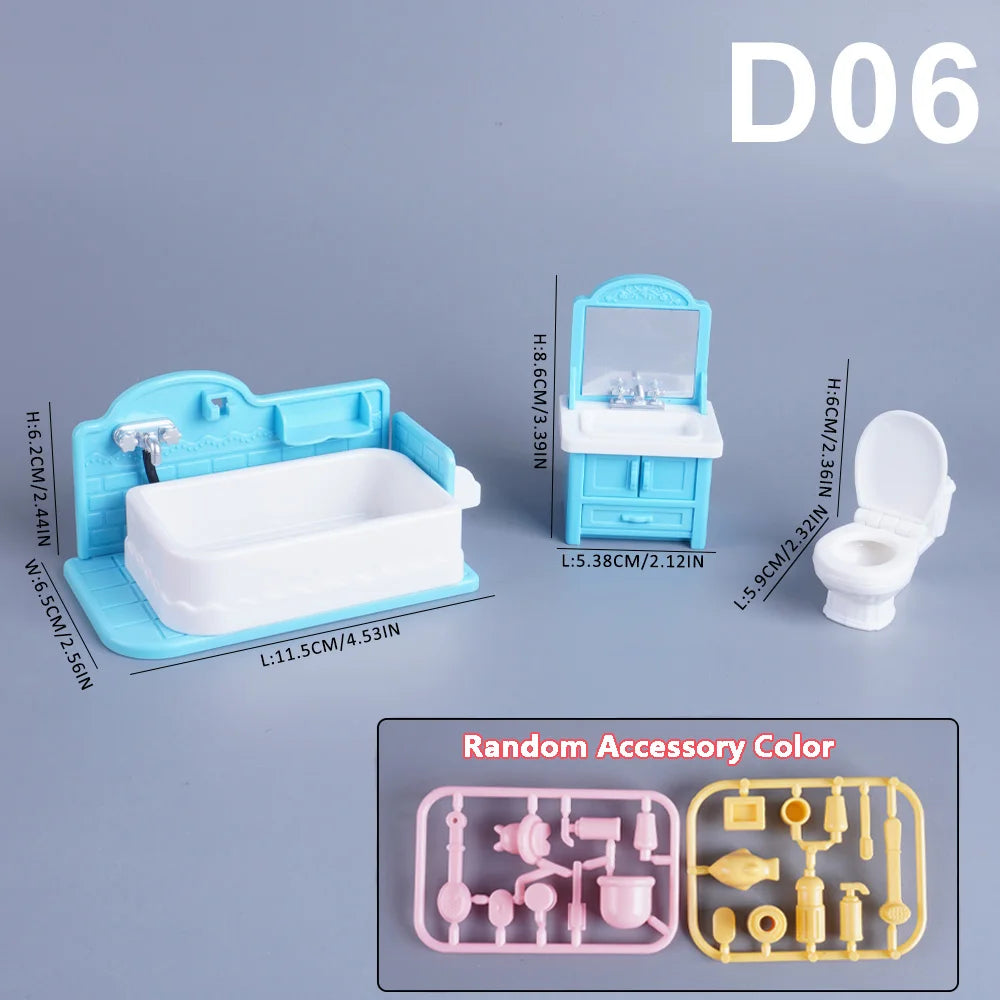 A set of light blue dollhouse furniture including a bathtub, toilet, and various accessories for a 1:12 scale dollhouse