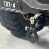 Close-up of a black metal trailer hitch receiver for an RC crawler car.