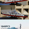 A detailed 1:350 scale model kit of the German Bismarck Battleship featuring gray and black naval details.