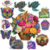 A colorful arrangement featuring a butterfly, a cat, and a bee, used as components for a wooden animal puzzle set.