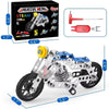 A detailed model of a metal building motorcycle construction kit with tools and parts displayed on a white background.
