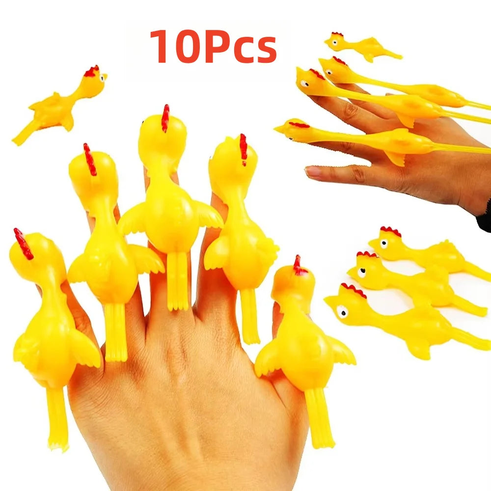 Ten yellow catapult chicken flying toys being held and launched by a hand