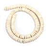 A strand of natural light beige turquoise stone beads coiled into a circular shape.