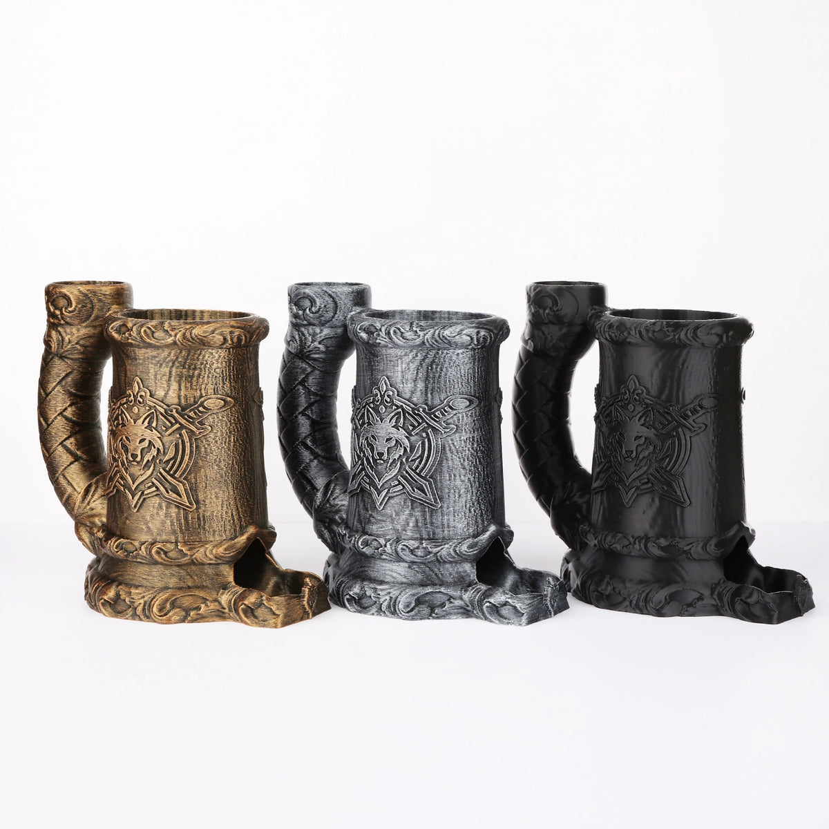 A set of three dark and bronze-colored mugs featuring a wolf emblem design for tabletop RPGs.