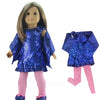 A doll wearing a royal blue sparkly top and pink pants.