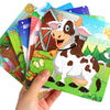 A colorful wooden jigsaw puzzle featuring a cow and a barn scene for toddlers.