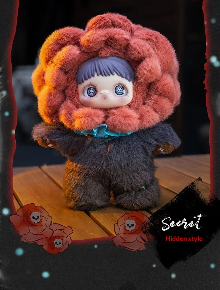 A fluffy, reddish-brown plush doll with purple hair and blue accents sits on a wooden surface.