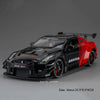 A black and red Nissan GT-R sports car diecast model with a large rear wing displayed on a gray background.
