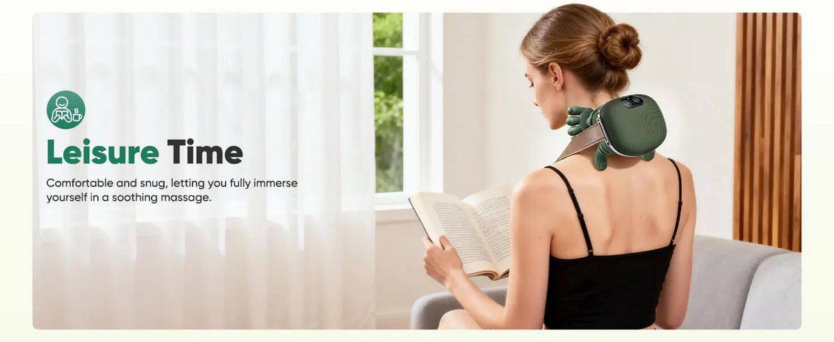 A woman is using a green wireless neck and shoulder massager while relaxing indoors.