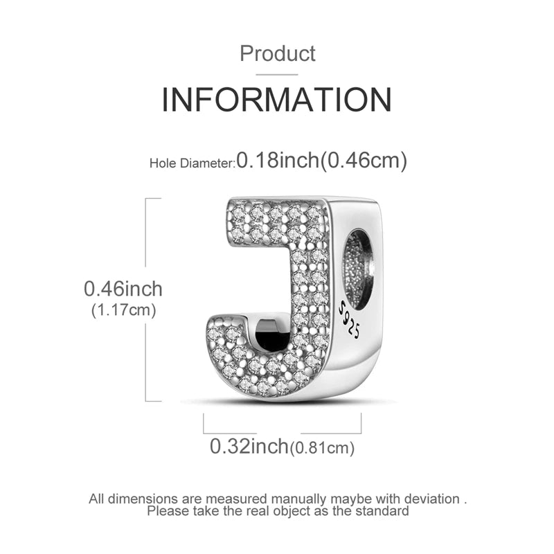 A sterling silver charm bead shaped like the letter J with pave-set diamonds.
