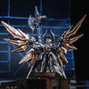 A highly detailed silver metal figurine of an winged adjudicator with a staff and armor.