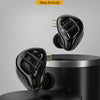 A pair of black KZ-ZAR hybrid in-ear monitors shown with the left and right earpieces displayed above a dark storage containe
