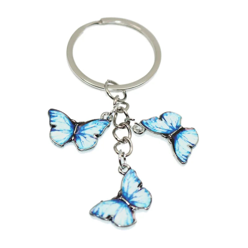 Silver hoop keychain with a blue butterfly charm
