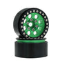 Black beadlock wheels with a green center and removable hex hub for an RC crawler.