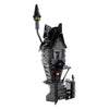 A detailed building block set of a haunted house featuring a dark gray structure and a glowing lantern.