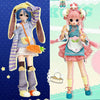 A pair of anime-style BJD dolls featuring blue hair and pink hair in colorful outfits.