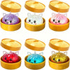 A set of colorful unicorn dumpling squishy stress balls in various colors packaged in bamboo steamer boxes.
