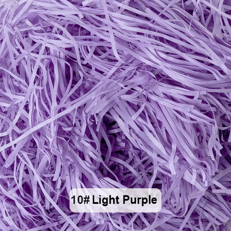 Purple raffia paper shreds used for gift boxes and baskets