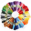 A circular arrangement of multicolor embroidery floss skeins in various shades including red, purple, green, yellow, and blue