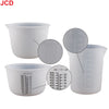 A set of clear silicone measuring cups with volume markings for resin and epoxy measurements.