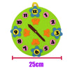A green felt clock face with colorful felt numbers and hands, measuring 25cm.