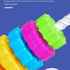 Colorful plastic stacking toy with various colored rings and a white piece, demonstrating a collision sound.