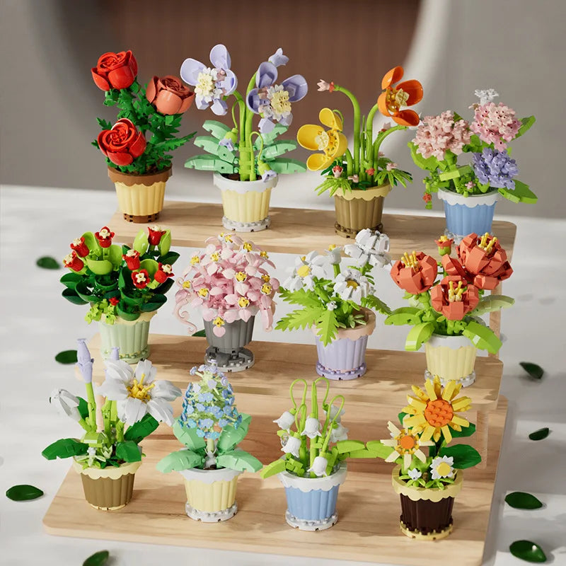 A collection of building block flower bouquet kits featuring roses and sunflowers in various colors and arrangements.