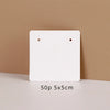 A white square jewelry display card is shown against a beige background with a measurement of 50p 5x5cm below it.