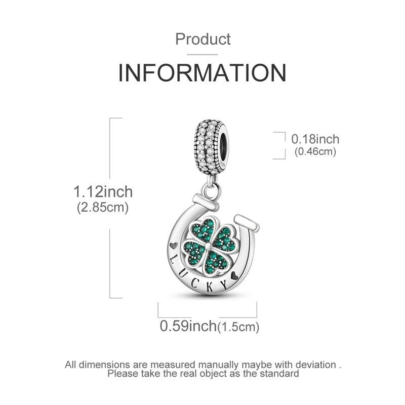 A silver heart charm with a four-leaf design and the word lucky is shown on a necklace chain.