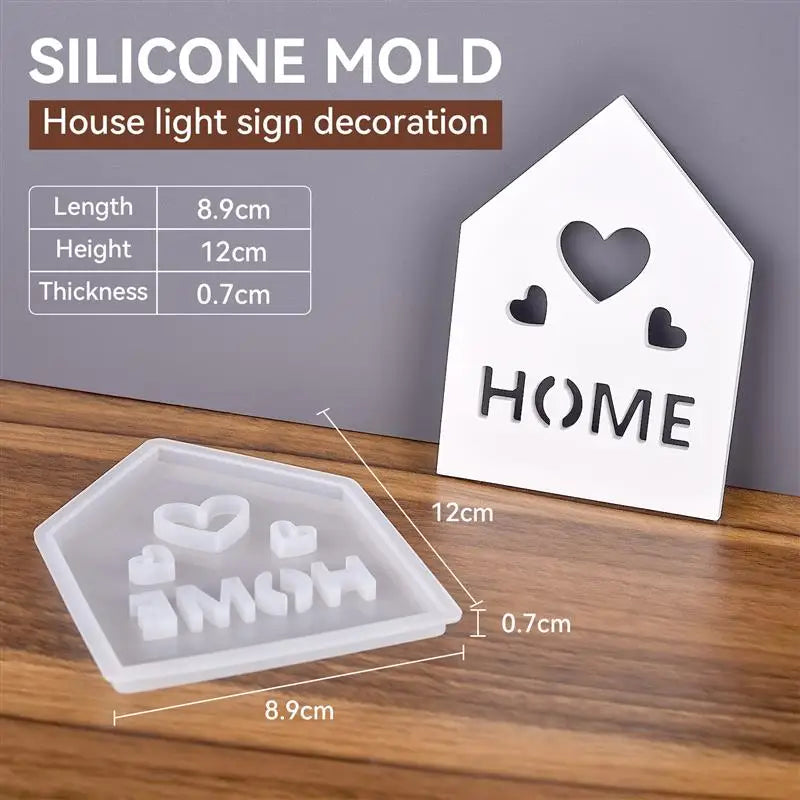 A white silicone mold set for making house light sign decorations, showing a heart and the word HOME.