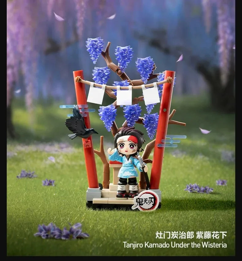 Collectible blind box figures of Tanjiro Kamado under the Wisteria, featuring a character in a blue outfit surrounded by purp