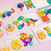 A collection of wooden dinosaur puzzles featuring various colors and shapes for children's educational play.