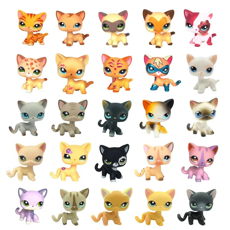 Eine Sammlung verschiedener Sammler-Kittenfiguren in verschiedenen Farben und Posen.
