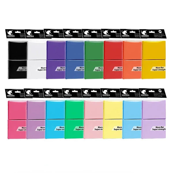 A row of matte trading card sleeves in various colors and finishes, packaged for protection.