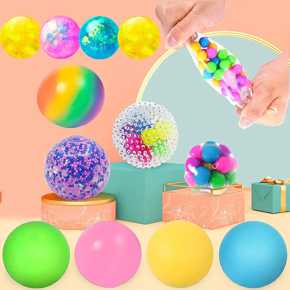 A collection of colorful water bead stress balls and fidget toys in various bright colors like yellow, pink, blue, green, and