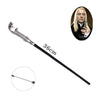 Elegant metal cosplay magic wand with a silver handle and black shaft shown next to a man in a dark suit.