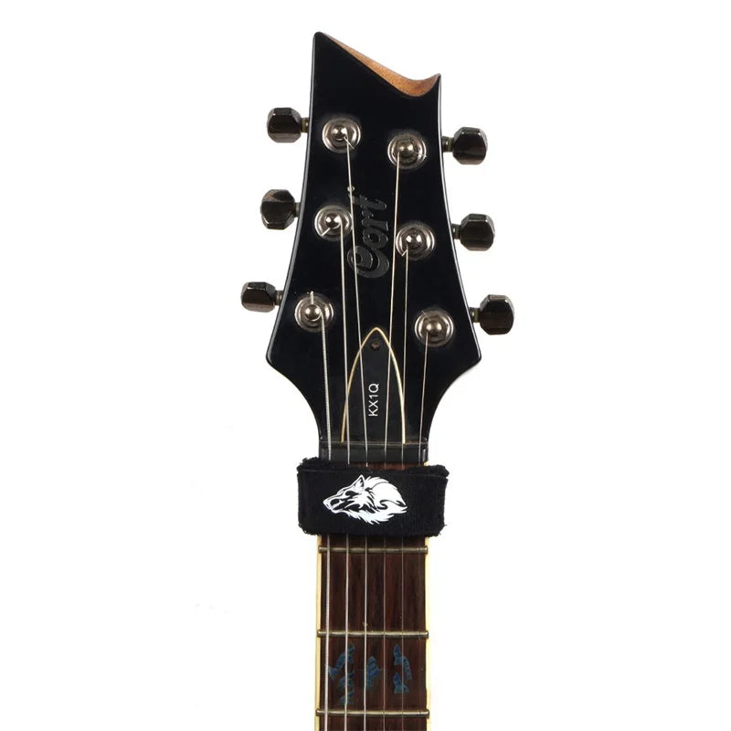 A black electric guitar neck featuring a saddle and tuning machines.