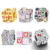 A collection of 925 sterling silver rotatable Rubik's cube charms in various colors and designs.
