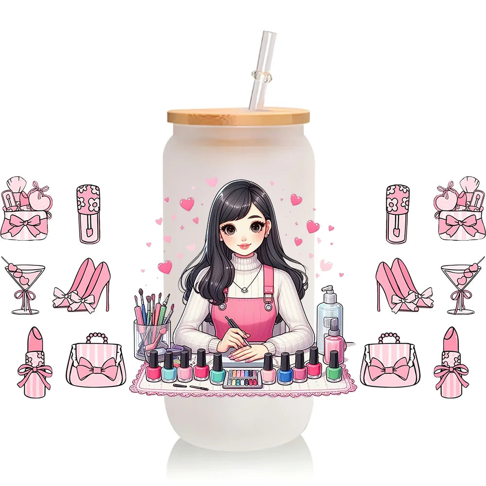 A clear cup with a straw features pink and purple makeup-themed illustrations, including lip glosses, palettes, and cosmetic 