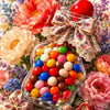 A diamond painting kit featuring cupcakes, watermelon, and strawberry designs with colorful floral accents.