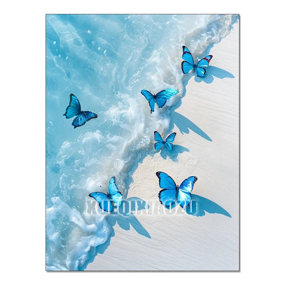 Blue butterflies flying over white sand and turquoise ocean waves.