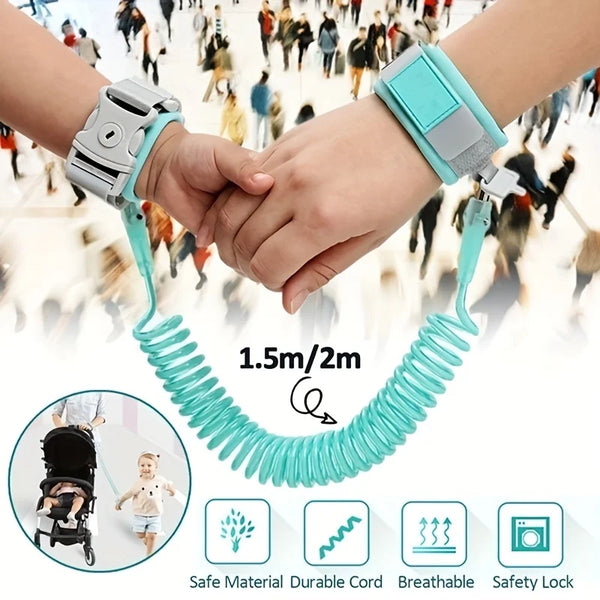 A pair of hands holding a teal wrist link harness, demonstrating its 1.5m/2m reach and safety features.