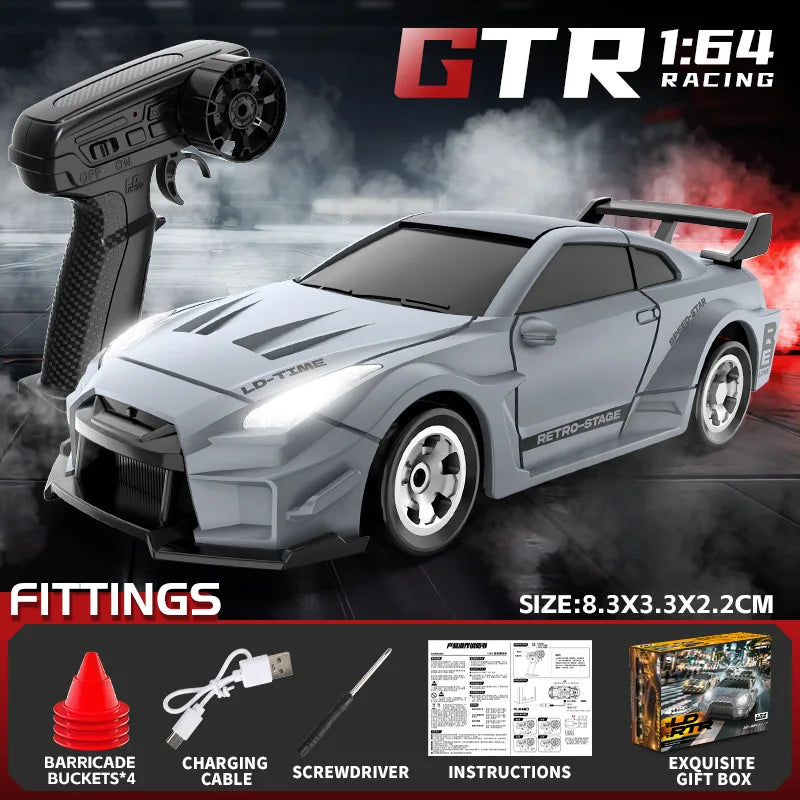 GTR 1:64 Racing car model with a remote control and various fittings displayed on a dark background
