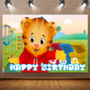 A cute cartoon tiger character smiling and waving, set against a bright outdoor background for a birthday party backdrop.