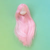 A long, flowing pink hairpiece or wig for a doll collectible.