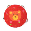A red wooden tambourine with a cartoon orange bear face and pink flowers.