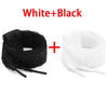 White and black flat elastic silk shoelaces shown next to each other.